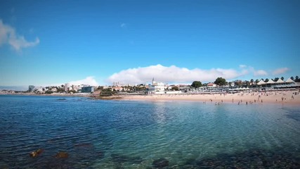 time lapse in a beach in a summer day. Tamariz beach in Estoril Portugal