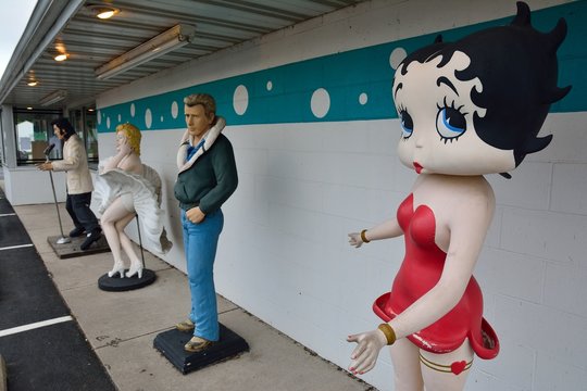 BRAIDWOOD, IL/USA - JULY 16: Statues of Elvis Presley, Marilyn Monroe, James Dean, and Betty Boop at the Polk-a-Dot (polka dot) Drive In on Route 66, on July 16, 2017, in Braidwood, Illinois.