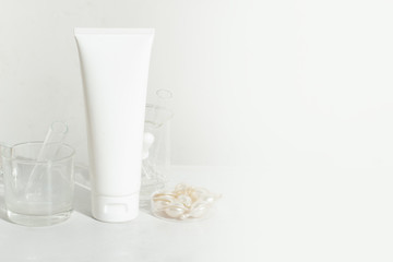 beauty spa medical skincare and cosmetic lotion bottle cream packaging product on white decor background and laboratory test glass tube in doctor healthy science concept