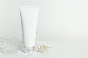 beauty spa medical skincare and cosmetic lotion bottle cream packaging product on white decor background and laboratory test glass tube in doctor healthy science concept
