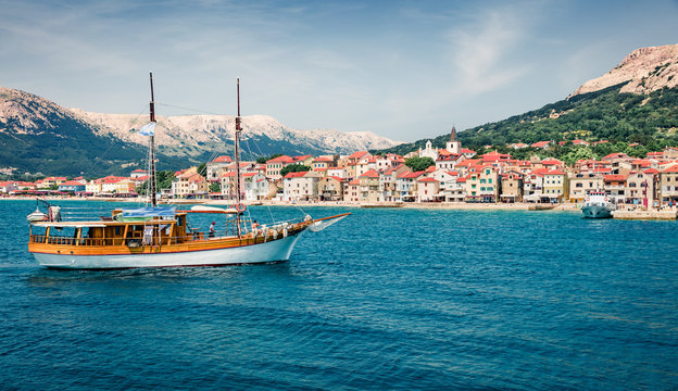 Picturesque morning cityscape of Bashka town. Magnificent summer seascape of Adriatic sea, Krk island, Kvarner bay archipelago, Croatia, Europe. Beautiful world of Mediterranean countries.