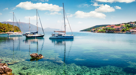 Captivating morning view of Fiskardo port. Picturesque spring seascape of Ionian Sea. Colorful...