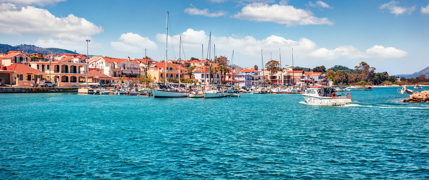 Panoramic morning view of Lixouri port. Splendid spring seascape of Ionian Sea. Sunny outdoor scene of Kefalonia island. Traveling concept background. Traveling concept background.