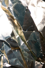 Abstract Shiny Paper Multicolour Glowing Sci-fi Cut Up Background in Silver