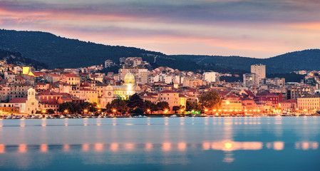 Colorful evening panorama of Sibenik city. Dramatic summer seascape of Adriatic sea, Croatia, Europe. Beautiful world of Mediterranean countries. Traveling concept background. © Andrew Mayovskyy