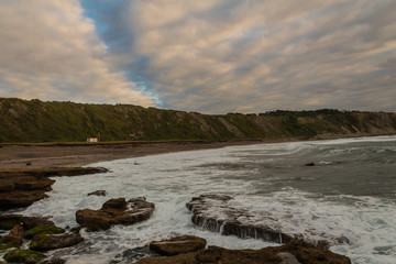 sunset on the beach of Azkorri, in Biscay