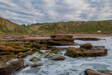 sunset on the beach of Azkorri, in Biscay