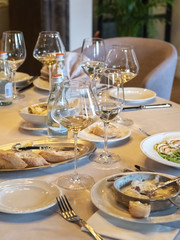 Dining table with the remains of the meal after dinner.