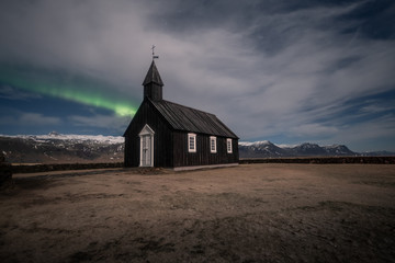Northern lights aurora borealis Black church in Iceland
