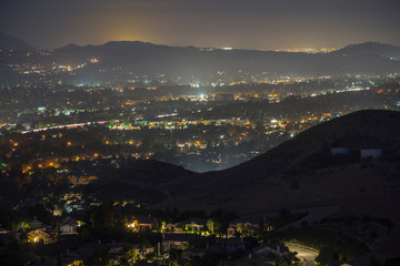 Hazy night mountaintop view of suburban Simi Valley near Los Angeles in Ventura County, California.
