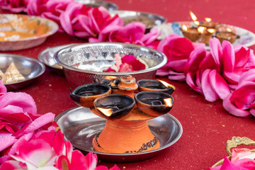 Traditional south indian ceramic oil lamp 'Nilavilakku' on wedding ceremony, Nilavilakku is lighted before starting the rituals