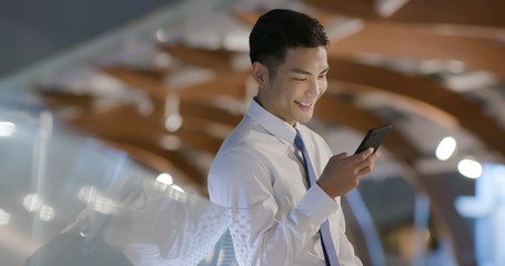 businessman use phone outdoor