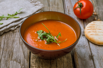 Soup cream of tomato on the bowl