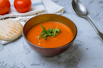Soup cream of tomato on the bowl