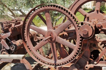 Rusty gears and parts outdoors