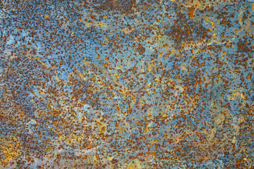 Abstract grunge rustic background. Colorful rusty background. Selective focus