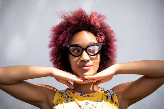 Young Woman Curly Hair and Glasses