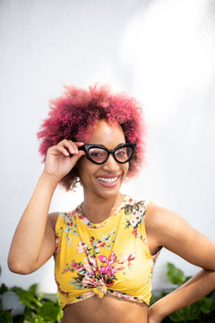 Young Woman Curly Hair and Glasses