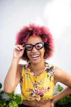 Young Woman Curly Hair and Glasses