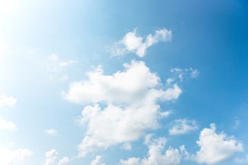 Nature Bright blue Sky with white clouds on blackground. Beautiful sky and clouds in the afternoon.