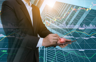 Businessmen analyze graphs with computers, smartphones and tablet technology social networks.