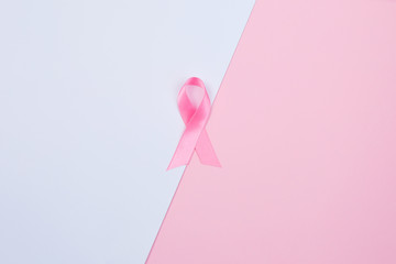 Pink satin ribbon breast cancer awareness month.