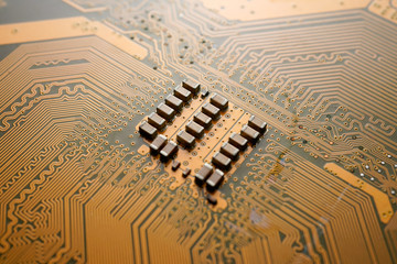 A Orange colour waterproof water resistant Printed Circuit Board with CPU, SMD & IC mounted part on...