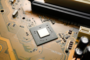 A Orange colour waterproof water resistant Printed Circuit Board with CPU, SMD & IC mounted part on...