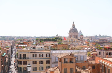 Fototapeta na wymiar Rome historical city cityscape with SS Ambrogio e Carlo al Corso church Italy