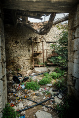 Garbage and old ruined walls
