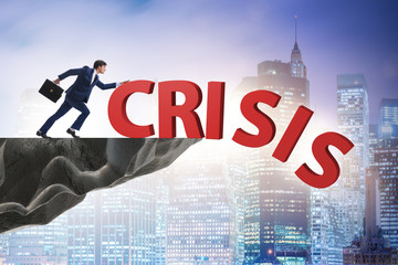 Businessman in crisis management concept