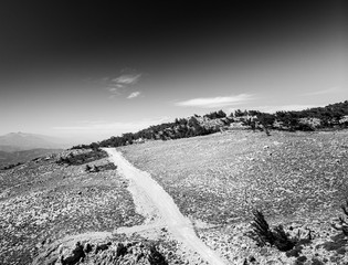 Track on landscape against sky