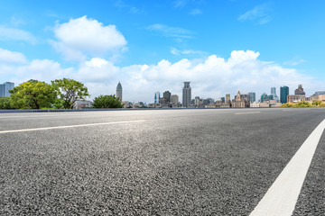 Empty asphalt highway and city skyline with buildings in Shanghai,China.