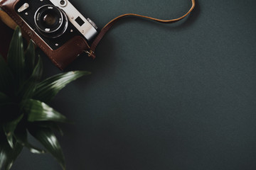 Top view of a flat lay film camera in a case