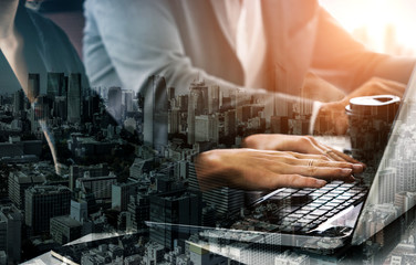 Double Exposure Image of Business Person on modern city background. Future business and...