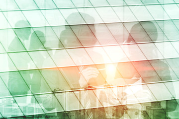 Double exposure image of faded business abstract background with office building and people...