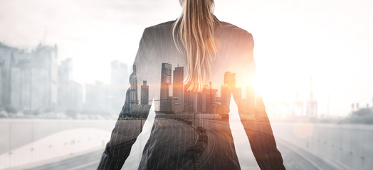 Double Exposure Image of Business Person on modern city background. Future business and...