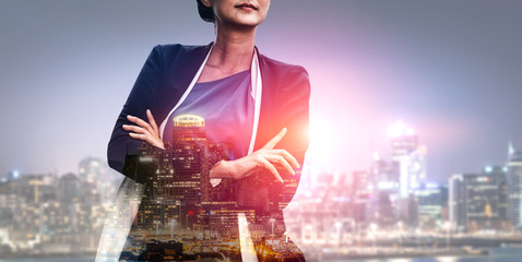 Double Exposure Image of Business Person on modern city background. Future business and...