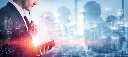 Double Exposure Image of Business Person on modern city background. Future business and...