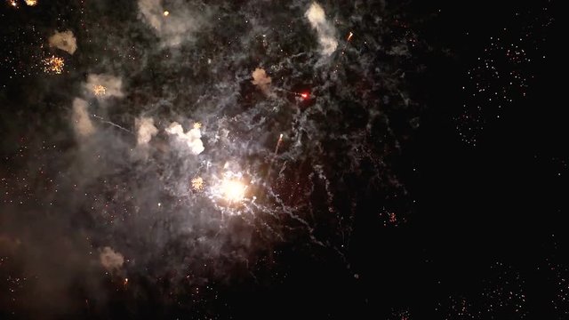 Fireworks Flashing in the Night Sky. Slow Motion in 180 fps. Real Fireworks with Smoke