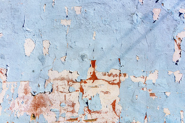 A wall with peeling paint as a background