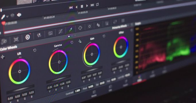 Close up shot of someone working on computer program of video processing colorful sliders. Notebook digital screen of media editing tool equipment slow motion 4k. Footage film studio  