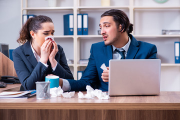 Two employees suffering at workplace