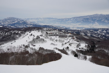 View of ski resort from top of mountain in Nagano