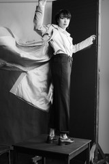 Woman portrait in minimalistic interior