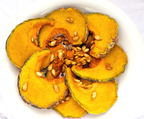 slices of pumpkin isolated on white background