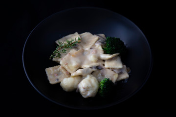 Mushroom ravioli, cauliflower with carbonara sauce
