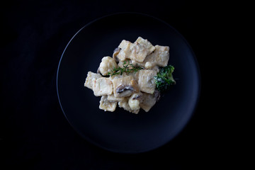 Mushroom ravioli with garlic, walnuts, ricotta and thyme