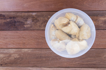 Durian flesh or pulp packed into container for storage