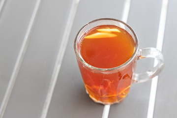 Black tea with ginger slice or known as Teh O Halia